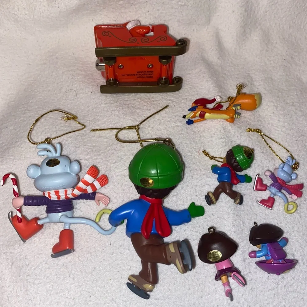 Go Diego and Dora holiday ornament characters with boots, swiped and Santa too!